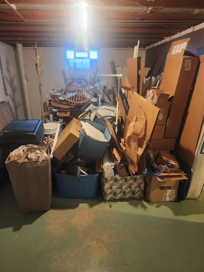 Roll-off dumpster container at job site for Yard Waste Dumpster Rental in Liberal